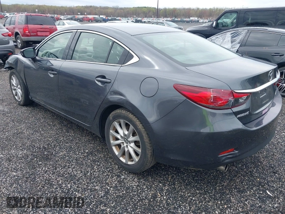 2016 Mazda 6 i Sport with VIN JM1GJ1U55G1472416, listed as a IAAI auction lot 41961622 with 157,315 mi miles and . Bid and sale history available at DreamBid. Image 3.