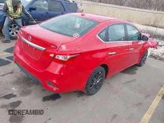 2018 Nissan Sentra SV with VIN 3N1AB7AP6JL617087, listed as a IAAI auction lot 41702341 with 59,310 mi miles and . Bid and sale history available at DreamBid. Image 4.