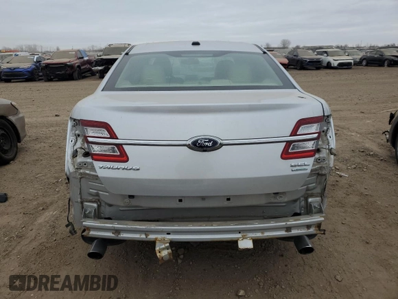 2016 Ford Taurus SEL with VIN 1FAHP2E9XGG144955, listed as a Copart auction lot 82207634 with 128,823 mi miles and Salvage Title. Bid and sale history available at DreamBid. Image 6.