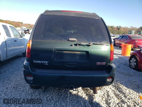 2003 GMC Envoy XL SLT with VIN 1GKES16S736244099, listed as a Copart auction lot 83832054 with 249,320 mi miles and Salvage Title. Bid and sale history available at carsss.com. Image 6.