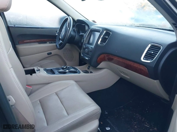 2014 Dodge Durango Citadel with VIN 1C4RDJEG3EC277996, listed as a IAAI auction lot 40517339 with 999,999 mi miles. Bid and sale history available at carsss.com. Image 5.