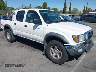 2004 Toyota Tacoma PreRunner z VIN 5TEGN92N54Z427595, wystawiony jako IAAI lot #41939274 z przebiegiem 249 307 mil mil oraz . Historia ofert i sprzedaży dostępna na DreamBid. Obrazek 1.