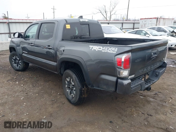 2022 Toyota Tacoma SR with VIN 3TMCZ5AN4NM476170, listed as a IAAI auction lot 41482149 with 57,126 mi miles and . Bid and sale history available at DreamBid. Image 3.