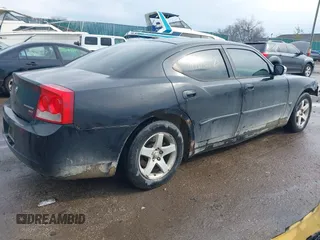 2010 Dodge Charger SXT with VIN 2B3CA3CV7AH144369, listed as a IAAI auction lot 41911678 with 235,218 mi miles. Bid and sale history available at carsss.com. Image 4.