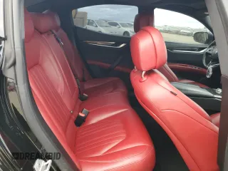 2017 Maserati Ghibli z VIN ZAM57XSA6H1217313, wystawiony jako Copart lot #46475785 z przebiegiem 51 798 mil mil oraz Szkoda całkowita • Salvage title. Historia ofert i sprzedaży dostępna na DreamBid. Obrazek 10.