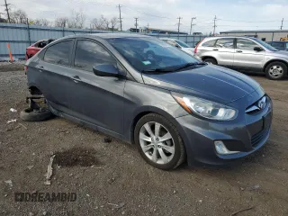 2012 Hyundai Accent GLS z VIN KMHCU4AE4CU185892, wystawiony jako Copart lot #52803675 z przebiegiem 168 792 mil mil oraz Szkoda całkowita • Salvage title. Historia ofert i sprzedaży dostępna na DreamBid. Obrazek 4.