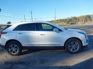 2021 Cadillac XT5 AWD Premium Luxury with VIN 1GYKNDRS3MZ115273, listed as a IAAI auction lot 41228531 with 46,556 mi miles. Bid and sale history available at carsss.com. Image 13.