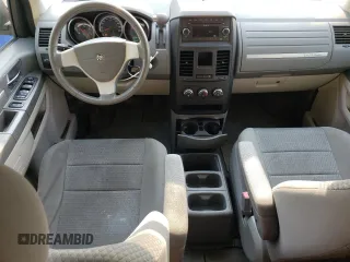 2009 Dodge Grand Caravan SE with VIN 2D8HN44E29R694728, listed as a Copart auction lot 60287565 with 233,018 mi miles and Clean title. Bid and sale history available at DreamBid. Image 8.