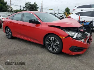 2016 Honda Civic EX-T with VIN 2HGFC1F36GH648281, listed as a Copart auction lot 58599385 with 131,145 mi miles and Salvage title. Bid and sale history available at DreamBid. Image 4.