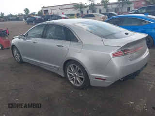 2013 Lincoln MKZ z VIN 3LN6L2G98DR803528, wystawiony jako IAAI lot #42573341 z przebiegiem 140 006 mil mil oraz . Historia ofert i sprzedaży dostępna na DreamBid. Obrazek 3.