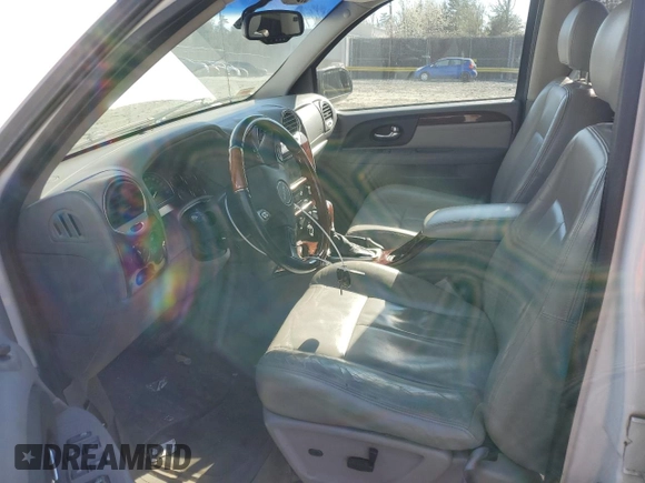 2007 GMC Envoy Denali with VIN 1GKET63MX72296808, listed as a Copart auction lot 50566995 with 173,244 mi miles and Salvage Title. Bid and sale history available at carsss.com. Image 7.