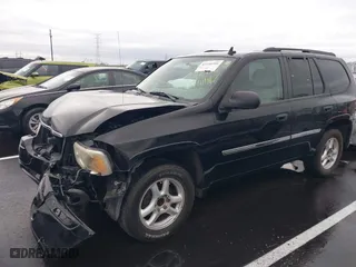 2007 GMC Envoy SLE with VIN 1GKDS13S872309605, listed as a IAAI auction lot 41946509 with 184,638 mi miles. Bid and sale history available at carsss.com. Image 2.