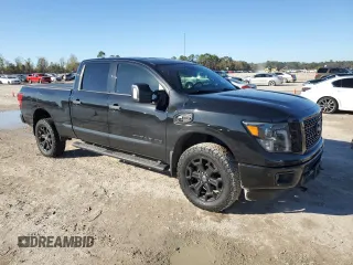 2019 Nissan Titan XD SL with VIN 1N6BA1F41KN529918, listed as a Copart auction lot 85999634 with 91,086 mi miles and Salvage Title. Bid and sale history available at carsss.com. Image 4.