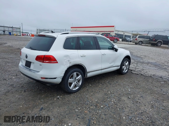 2012 Volkswagen Touareg Sport z VIN WVGEF9BP0CD006506, wystawiony jako IAAI lot #42355432 z przebiegiem 175 346 mil mil oraz . Historia ofert i sprzedaży dostępna na DreamBid. Obrazek 4.