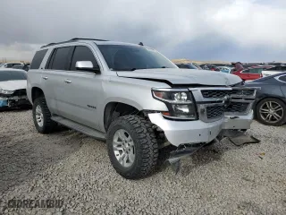 2015 Chevrolet Tahoe LT with VIN 1GNSKBKCXFR309136, listed as a Copart auction lot 44278505 with 136,978 mi miles and Salvage Title. Bid and sale history available at carsss.com. Image 4.