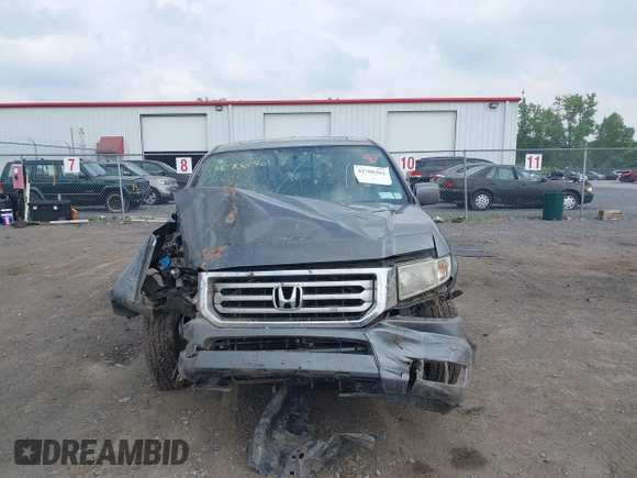 2013 Honda Ridgeline RTL with VIN 5FPYK1F56DB004834, listed as a IAAI auction lot 42706361 with 230,000 mi miles and . Bid and sale history available at DreamBid. Image 12.