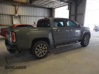 2022 GMC Canyon 4WD Denali with VIN 1GTG6EENXN1223923, listed as a Copart auction lot 68927644 with 30,495 mi miles and Salvage Title. Bid and sale history available at carsss.com. Image 3.