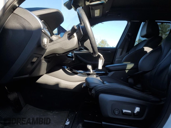 2022 BMW X3 sDrive30i with VIN WBX47DP0XNN186069, listed as a Copart auction lot 87093994 with 22,205 mi miles and Salvage Title. Bid and sale history available at DreamBid. Image 7.