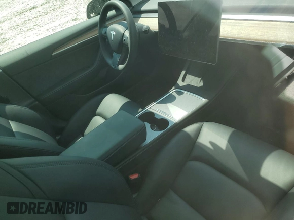 2023 Tesla Model 3 z VIN 5YJ3E1EA1PF608109, wystawiony jako Copart lot #72243744 z przebiegiem 10 165 mil mil oraz Szkoda całkowita • Salvage title. Historia ofert i sprzedaży dostępna na DreamBid. Obrazek 8.