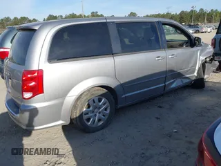 2016 Dodge Grand Caravan SE with VIN 2C4RDGBG5GR314936, listed as a IAAI auction lot 41889795 with 192,621 mi miles and . Bid and sale history available at DreamBid. Image 4.