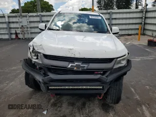2018 Chevrolet Colorado 2WD Z71 z VIN 1GCGSDEA5J1165569, wystawiony jako Copart lot #56703285 z przebiegiem 101 894 mil mil oraz Szkoda całkowita • Salvage title. Historia ofert i sprzedaży dostępna na DreamBid. Obrazek 5.