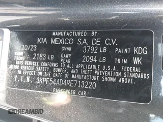 2024 Kia Forte GT-Line with VIN 3KPF54AD4RE713220, listed as a IAAI auction lot 42152996 with 37,649 mi miles. Bid and sale history available at carsss.com. Image 9.