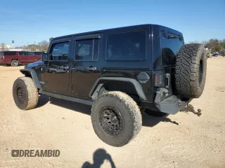 2014 Jeep Wrangler Unlimited Rubicon X with VIN 1C4HJWFG8EL119654, listed as a Copart auction lot 46699055 with 148,412 mi miles and Salvage title. Bid and sale history available at DreamBid. Image 2.