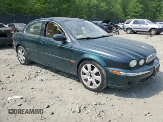 2004 Jaguar X-Type with VIN SAJEA51C64WE17722, listed as a Copart auction lot 55416405 with 89,047 mi miles and Salvage Title. Bid and sale history available at DreamBid. Image 4.