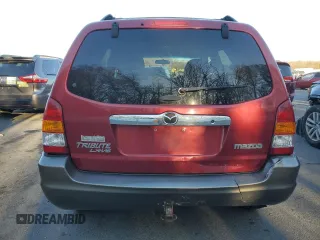 2001 Mazda Tribute LX with VIN 4F2CU08111KM19933, listed as a Copart auction lot 81174614 with 209,736 mi miles and Salvage Title. Bid and sale history available at DreamBid. Image 6.