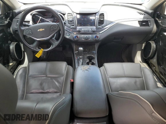 2014 Chevrolet Impala LTZ z VIN 2G1155S32E9156735, wystawiony jako Copart lot #55688325 z przebiegiem 129 710 mil mil oraz Szkoda całkowita • Salvage title. Historia ofert i sprzedaży dostępna na DreamBid. Obrazek 8.