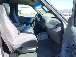 1999 Ford F-150 XL with VIN 2FTRX18LXXCA77730, listed as a IAAI auction lot 42181915 with 240,164 mi miles and . Bid and sale history available at DreamBid. Image 5.