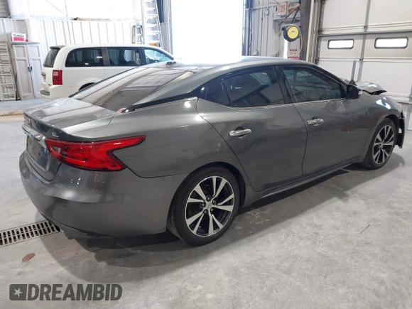 2018 Nissan Maxima SL z VIN 1N4AA6APXJC374220, wystawiony jako IAAI lot #42018130 z przebiegiem 119 776 mil mil oraz . Historia ofert i sprzedaży dostępna na DreamBid. Obrazek 4.