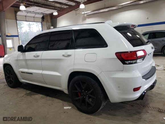 2021 Jeep Grand Cherokee SRT with VIN 1C4RJFDJXMC711364, listed as a Copart auction lot 85362514 with 24,528 mi miles and Salvage Title. Bid and sale history available at carsss.com. Image 2.