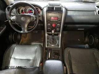 2012 Suzuki Grand Vitara Limited z VIN JS3TD0D76C4100949, wystawiony jako Copart lot #55834305 z przebiegiem 241 042 mil mil oraz Tytuł czysty. Historia ofert i sprzedaży dostępna na DreamBid. Obrazek 8.