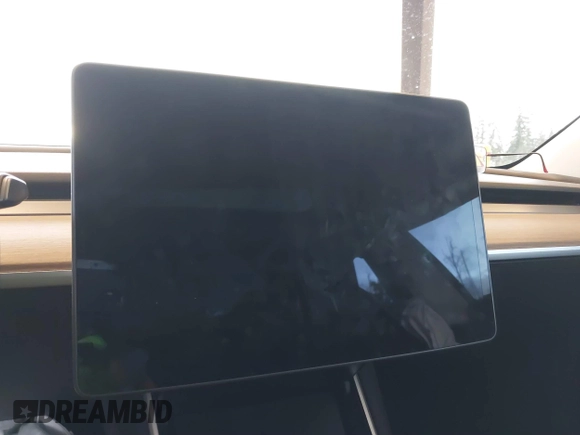 2018 Tesla Model 3 Long Range Battery z VIN 5YJ3E1EA7JF035949, wystawiony jako IAAI lot #41627027 z przebiegiem Nie podano mil oraz . Historia ofert i sprzedaży dostępna na DreamBid. Obrazek 15.