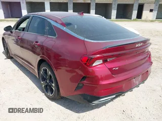 2022 Kia K5 GT-Line z VIN 5XXG64J25NG140300, wystawiony jako IAAI lot #41935077 z przebiegiem 51 279 mil mil oraz . Historia ofert i sprzedaży dostępna na DreamBid. Obrazek 3.