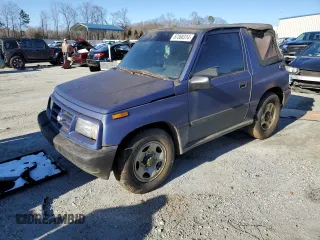 1998 Chevrolet Tracker z VIN 2CNBJ1863W6906496, wystawiony jako Copart lot #87368314 z przebiegiem 144 557 mil mil oraz Czysty tytuł • Clean title. Historia ofert i sprzedaży dostępna na DreamBid. Obrazek 2.