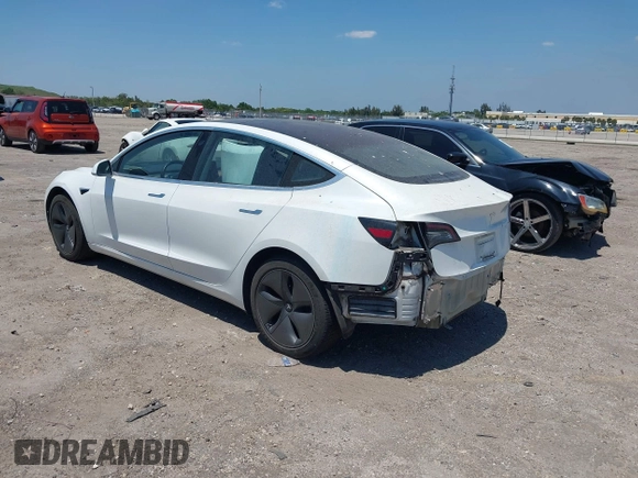 2018 Tesla Model 3 Long Range Battery with VIN 5YJ3E1EAXJF027179, listed as a IAAI auction lot 42059918 with 43,566 mi miles. Bid and sale history available at carsss.com. Image 3.