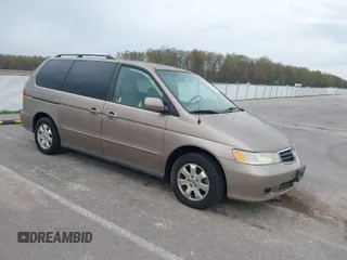 2004 Honda Odyssey EX-L with VIN 5FNRL18744B034830, listed as a IAAI auction lot 42052008 with 182,178 mi miles and . Bid and sale history available at DreamBid. Image 1.