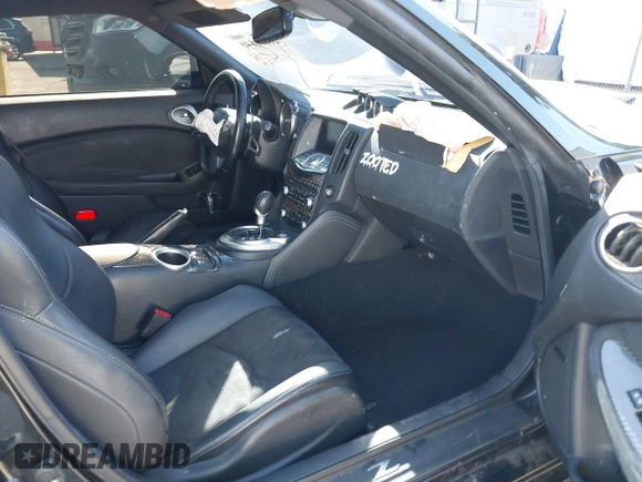 2009 Nissan 370Z Touring with VIN JN1AZ44E39M408668, listed as a IAAI auction lot 41231840 with 93,826 mi miles and . Bid and sale history available at DreamBid. Image 5.