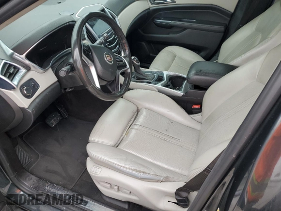 2014 Cadillac SRX Luxury Collection with VIN 3GYFNBE39ES655939, listed as a Copart auction lot 42861105 with 164,915 mi miles and Salvage Title. Bid and sale history available at DreamBid. Image 7.