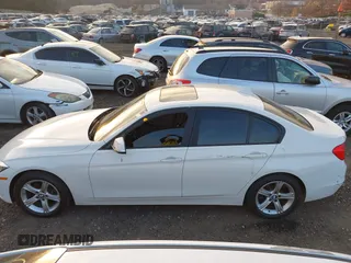 2014 BMW 3 Series 328i xDrive with VIN WBA3B5C52EF958635, listed as a IAAI auction lot 40916777 with 143,975 mi miles. Bid and sale history available at carsss.com. Image 13.