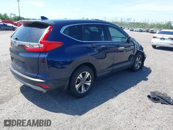 2019 Honda CR-V LX with VIN 2HKRW5H39KH400453, listed as a IAAI auction lot 40041024 with 76,932 mi miles and . Bid and sale history available at carsss.com. Image 4.