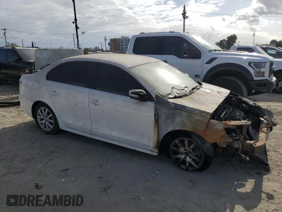 2013 Volkswagen Jetta SE with VIN 3VWDP7AJ7DM402692, listed as a Copart auction lot 51169345 with Not provided miles and Salvage title. Bid and sale history available at DreamBid. Image 4.