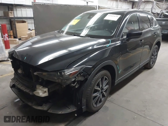2018 Mazda CX-5 Grand Touring z VIN JM3KFADMXJ0311101, wystawiony jako IAAI lot #42163070 z przebiegiem 129 284 mil mil oraz . Historia ofert i sprzedaży dostępna na DreamBid. Obrazek 18.