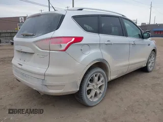 2015 Ford Escape Titanium with VIN 1FMCU9J92FUA60166, listed as a IAAI auction lot 41914080 with 103,122 mi miles and . Bid and sale history available at DreamBid. Image 4.