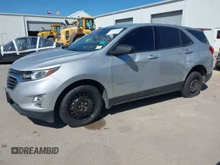 2019 Chevrolet Equinox LS z VIN 2GNAXHEV2K6175046, wystawiony jako IAAI lot #41483868 z przebiegiem 118 058 mil mil oraz . Historia ofert i sprzedaży dostępna na DreamBid. Obrazek 14.