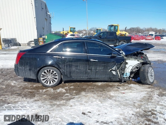 2014 Cadillac CTS Luxury AWD with VIN 1G6AX5SX3E0191673, listed as a IAAI auction lot 41617087 with 68,581 mi miles and . Bid and sale history available at DreamBid. Image 13.