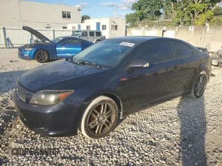 2007 Scion tC Spec with VIN JTKDE177370197342, listed as a Copart auction lot 82244514 with 143,075 mi miles and Salvage Title. Bid and sale history available at carsss.com. Image 1.