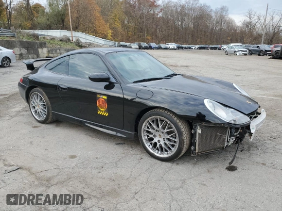 1999 Porsche 911 with VIN WP0AA2990XS626600, listed as a Copart auction lot 79217264 with 82,978 mi miles and Salvage Title. Bid and sale history available at DreamBid. Image 4.